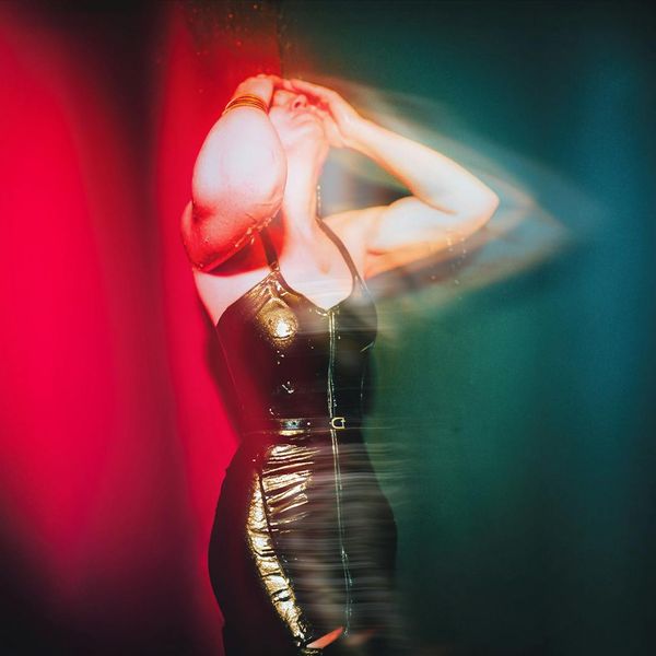 Woman feeling energized and vibrant after a yoga session.